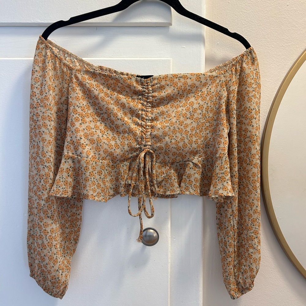 Floral blouse. Off the shoulder cropped with tie detail size small